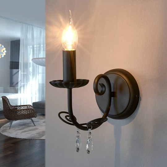 Vägglampa Sophina i form av en kristallkrona